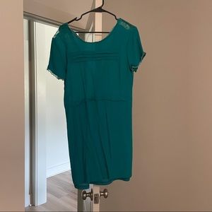 Green dress with open back (L but more true to M)